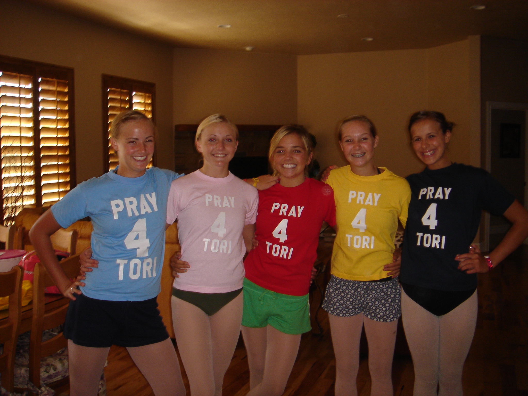 Dance Club friends showing off their P4T shirts