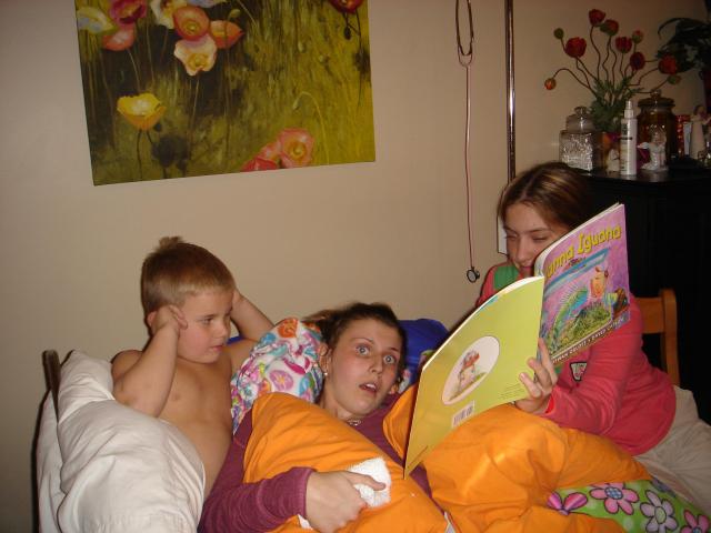 Chelsea reading to Tori and Brendan