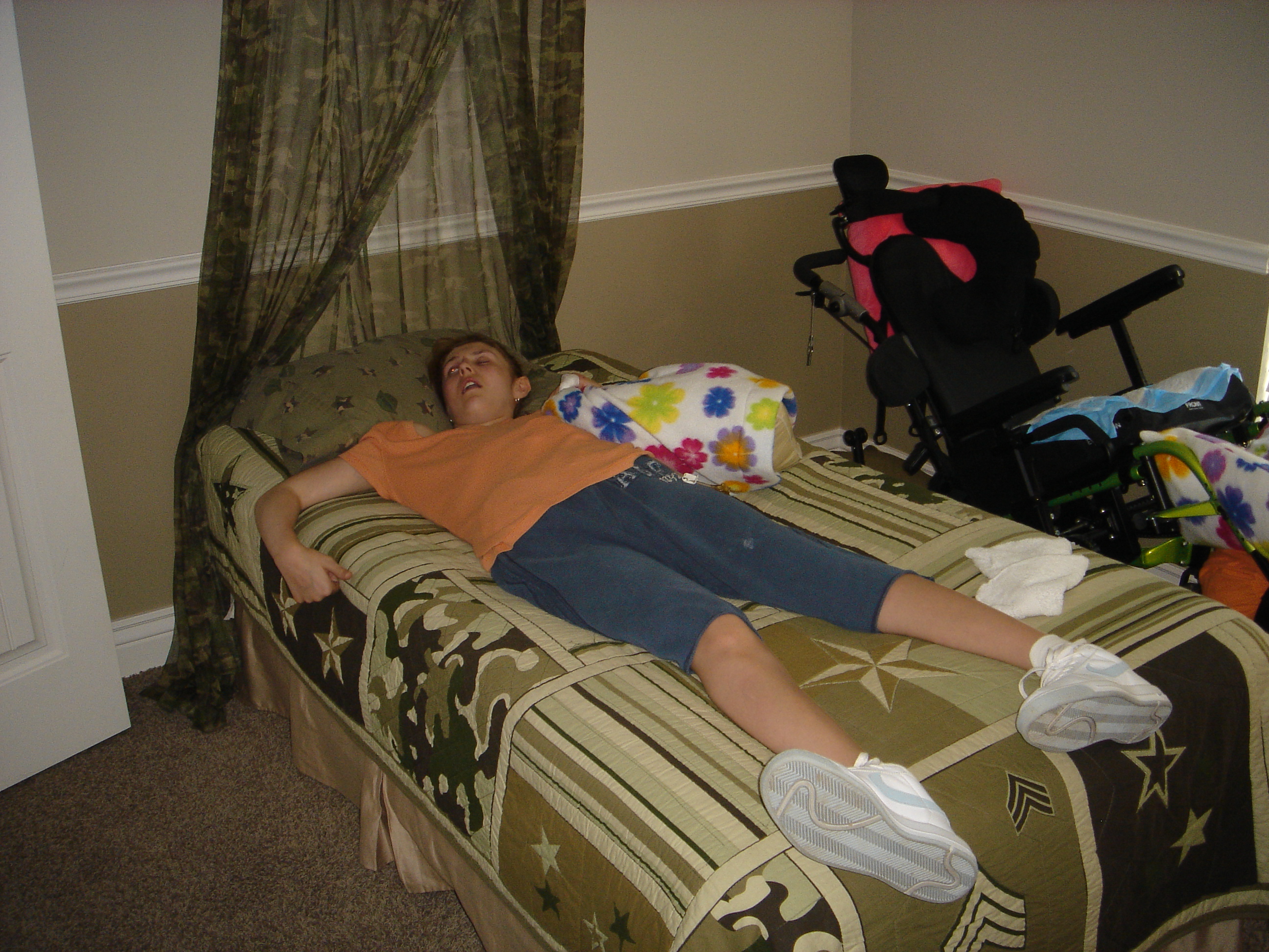 Tori taking a nap in Ryland's bed