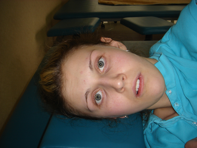 Tori relaxed and lying on her side Tori relaxed and lying on her side